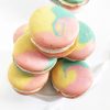 Pink, yellow, and blue swirl macarons