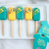 Blue, yellow, and orange cakesicles Blue, yellow, and orange cakesicles