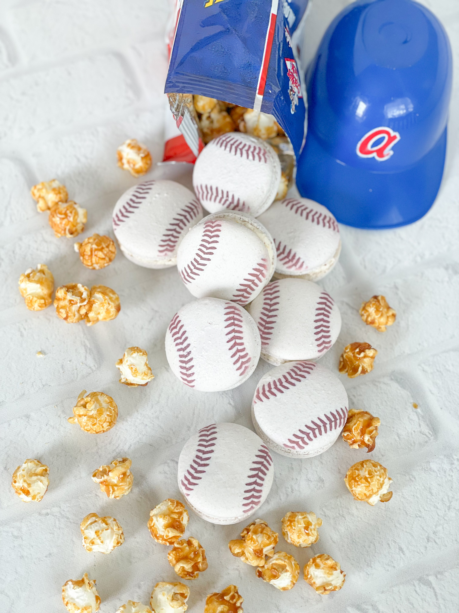 baseball macarons with cracker jack buttercream