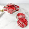 red velvet cookie with white chocolate drizzle