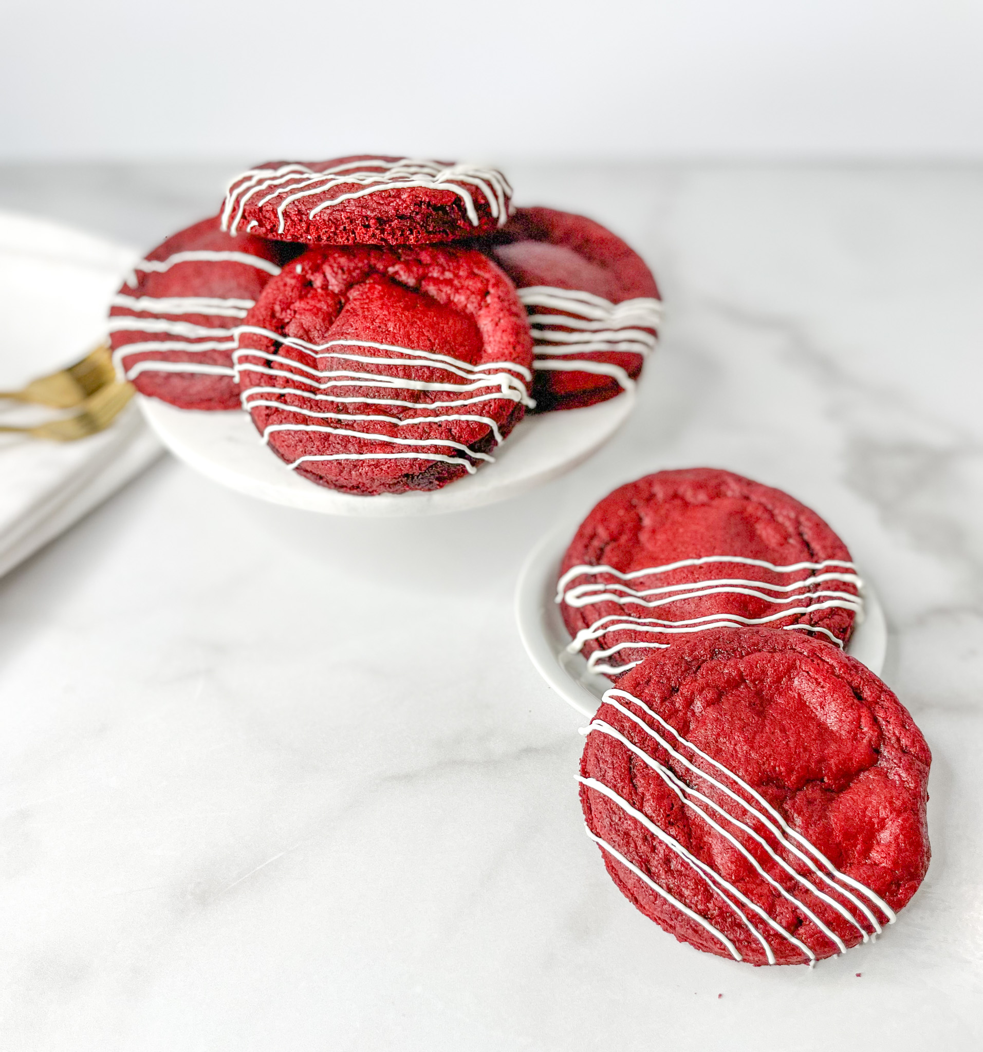 red velvet cookie with white chocolate drizzle