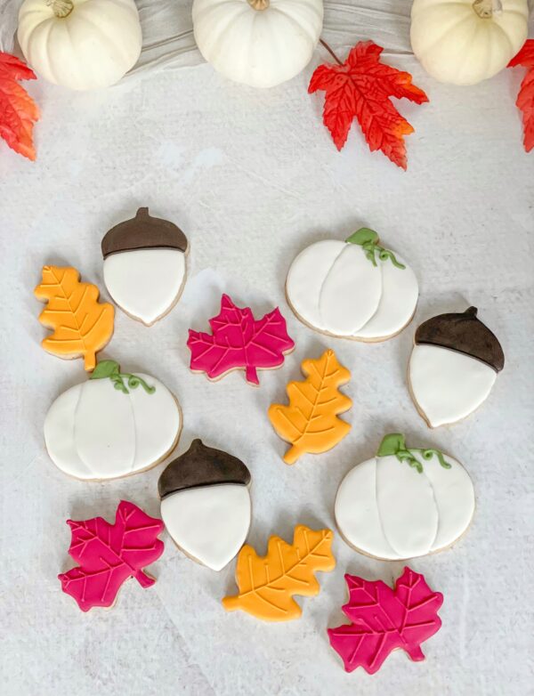 Cream pumpkins, maple leaves, oak leaves and acorn cookies Cream pumpkins, maple leaves, oak leaves and acorn cookies
