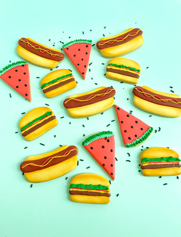 hamburgers, hot dogs, and watermelon