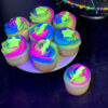 vanilla cupcakes with chocolate toppers Glow in the dark birthday cupcakes with neon buttercream and star and lightning toppers
