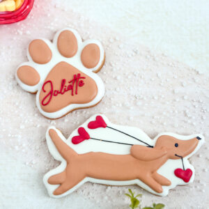 personalized paw print with doxie holding heart balloons