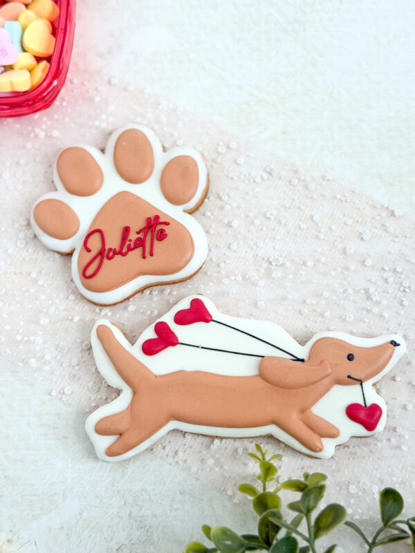personalized paw print with doxie holding heart balloons