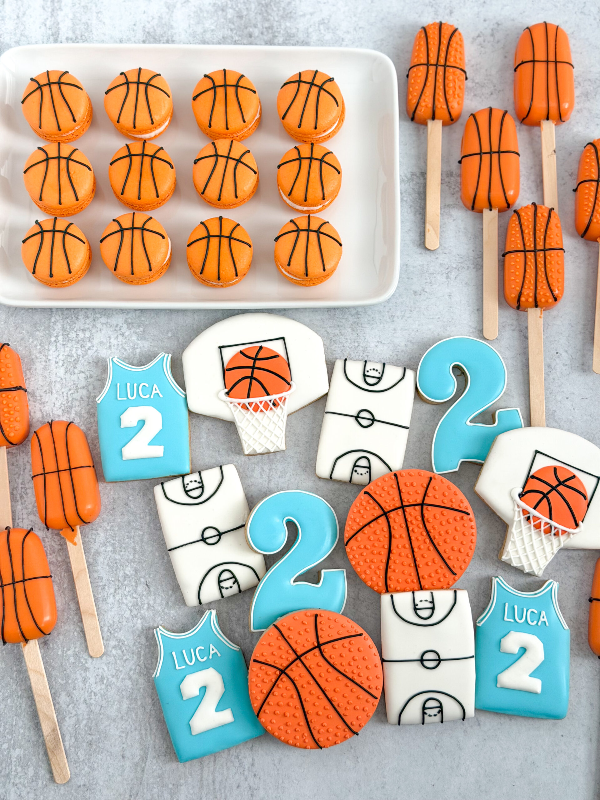 basketball macarons, basketball cakesicles, and personalized jersey, courts, basketballs, and #2 cookies