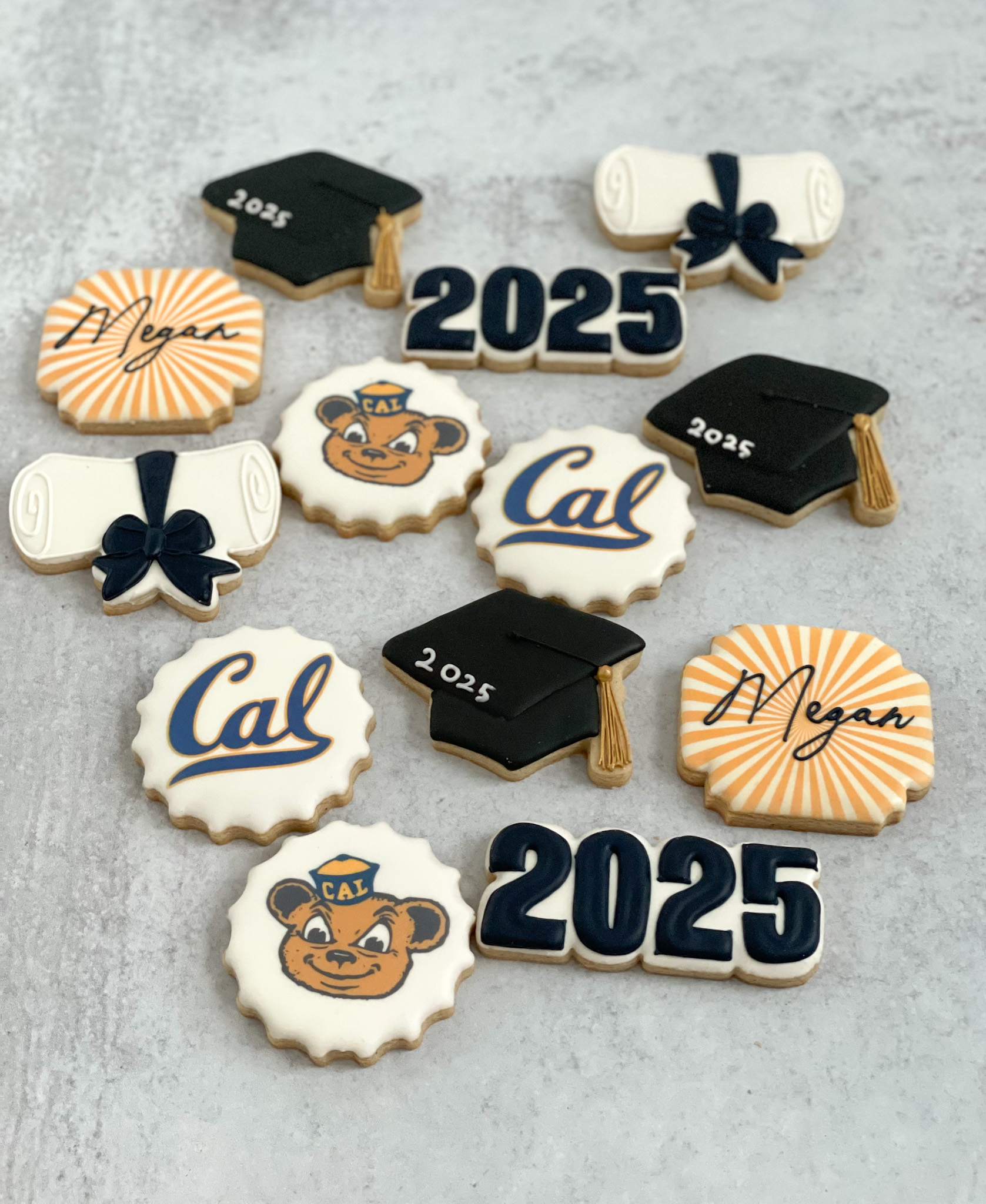 Diplomas, mortar boards, name, school logos