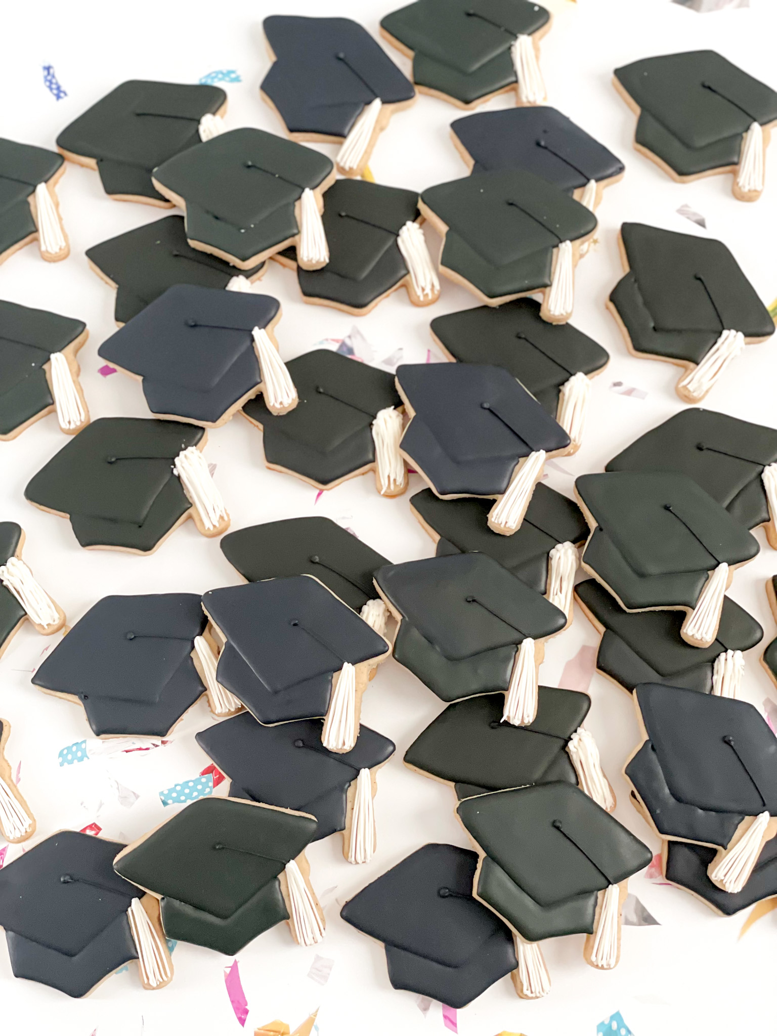 Black graduation cap with white tassel