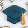 Gold tassel with black graduation cap Gold tassel with black graduation cap
