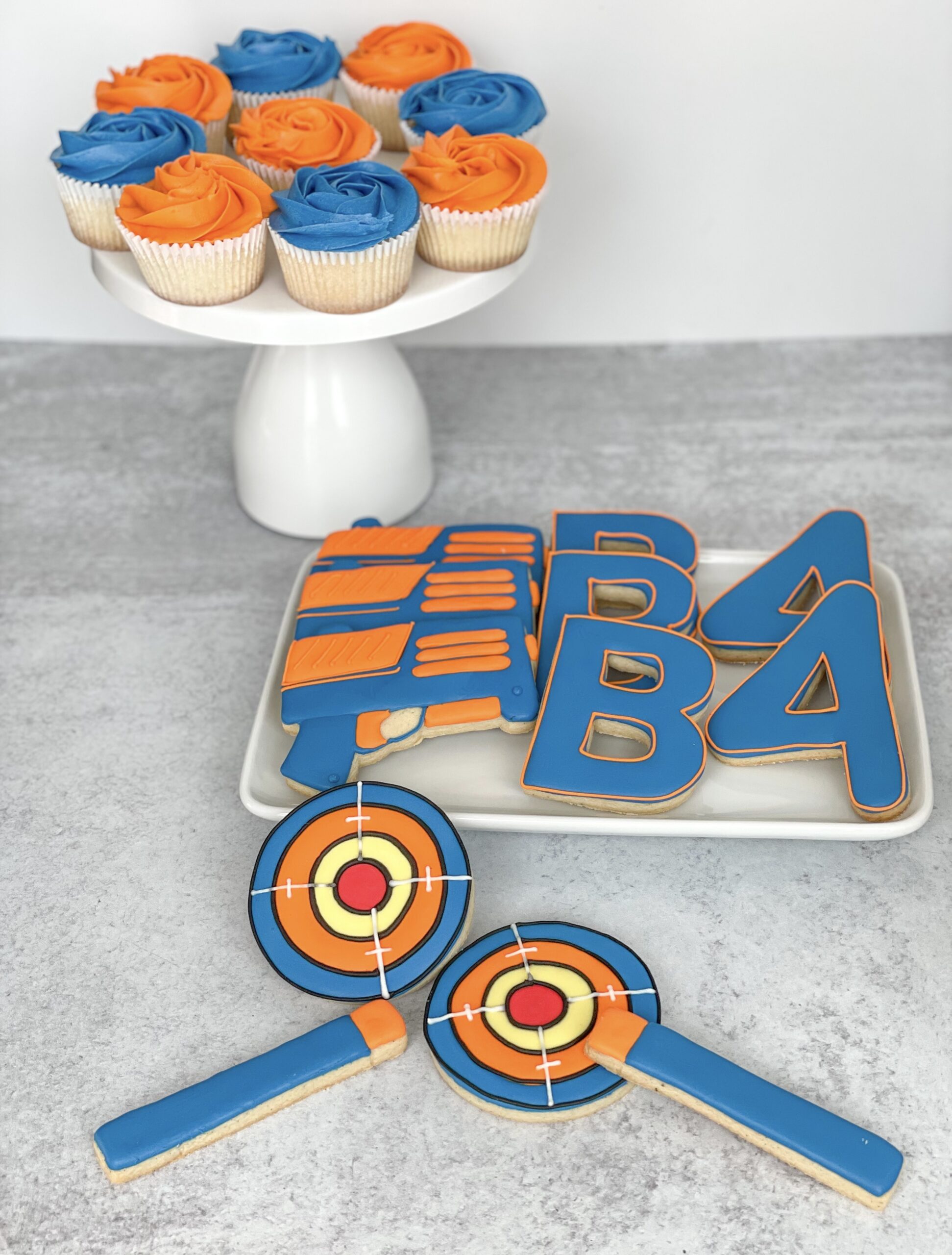 Initial and Number dart themed cookies Initial and Number dart themed cookies