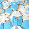 Baby It’s Cold Outside baby blue onesie with snowflake, bib, snowflake, miter, rattle