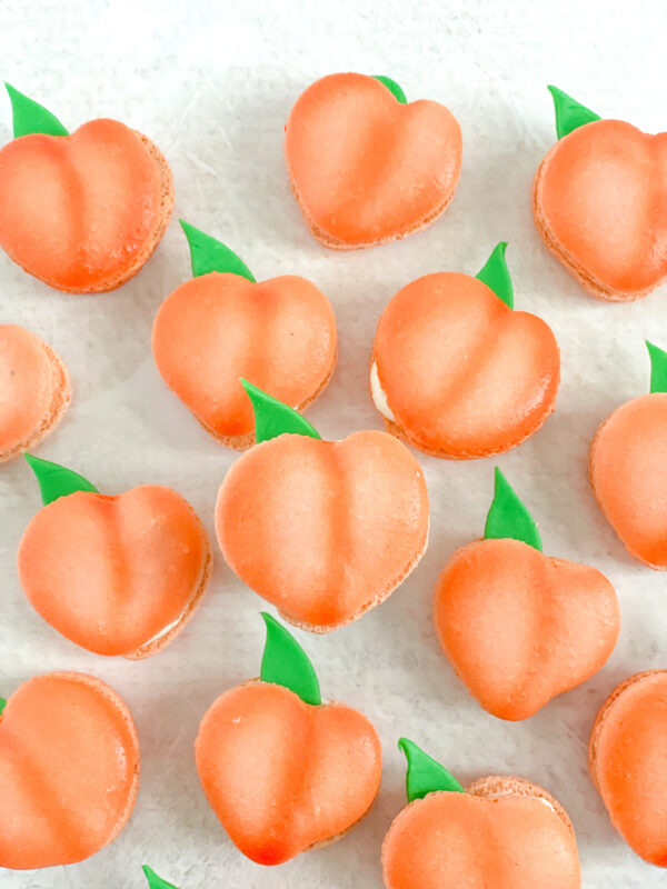 peach shaped macarons peach shaped macarons with an edible green leaf